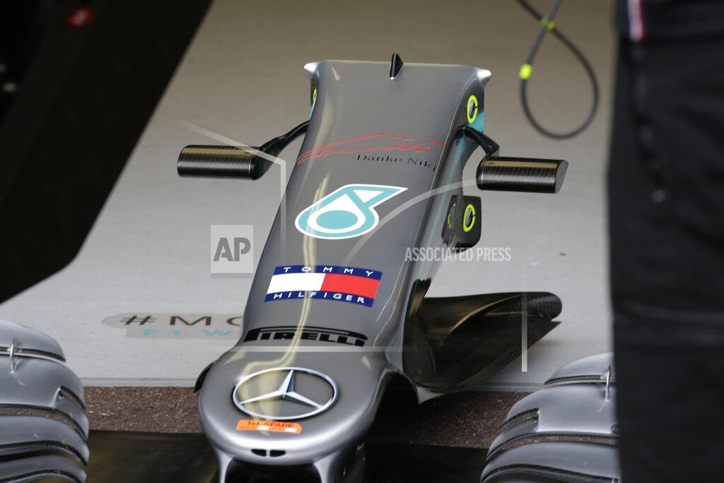 Luca Bruno A part of Mercedes driver Lewis Hamilton of Britain car with German that reads, "Thanks Niki," stands on the Mercedes garage during the first practice session at the Monaco racetrack, in Monaco, Thursday, May 23, 2019. Three-time Formula One world champion Niki Lauda, who won two of his titles after a horrific crash that left him with serious burns and went on to become a prominent figure in the aviation industry, has died on May 21, 2109. He was 70. (AP Photo/Luca Bruno)