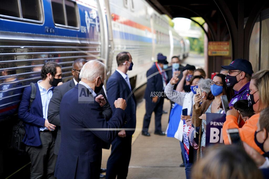 Andrew Harnik Democratic presidential candidate former Vice President Joe Biden greets supporters on the platform outside the Amtrak's Greensburg Train Station, Wednesday, Sept. 30, 2020, in Greensburg, Pa. Biden is on a train tour through Ohio and Pennsylvania today. (AP Photo/Andrew Harnik)