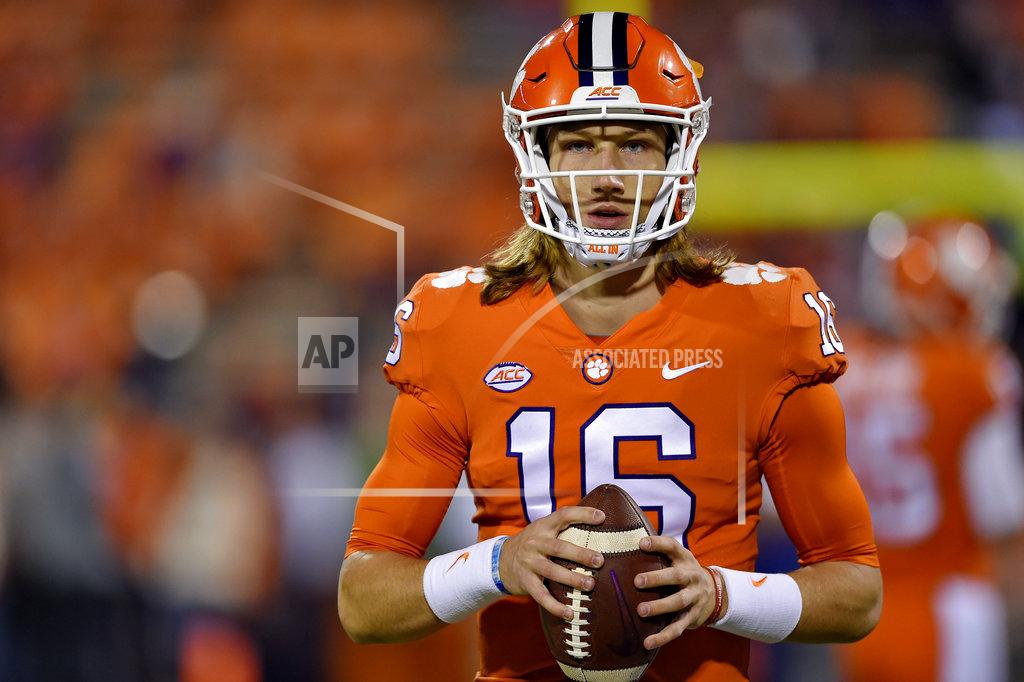 Richard Shiro Clemson quarterback Trevor Lawrence warms up before the start of an NCAA college football game against South Carolina, Saturday, Nov. 24, 2018, in Clemson, S.C. (AP Photo/Richard Shiro)
