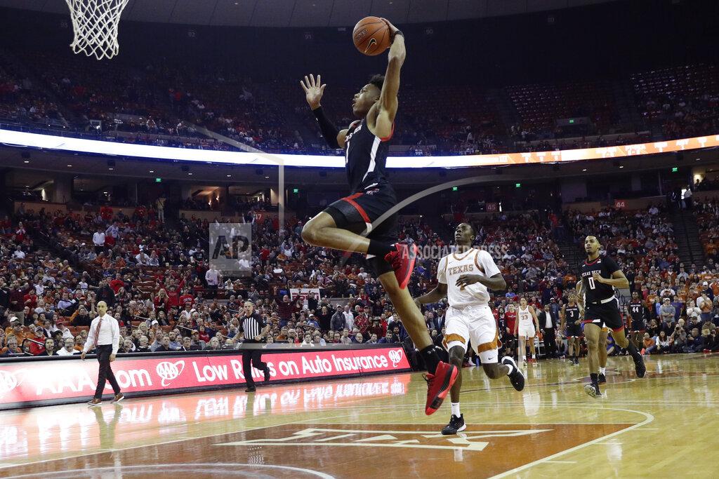 Eric Gay Texas Tech guard Terrence Shannon Jr. (1) drives to the basket for a score against Texas during the first half of an NCAA college basketball game, Saturday, Feb. 8, 2020, in Austin, Texas. (AP Photo/Eric Gay)