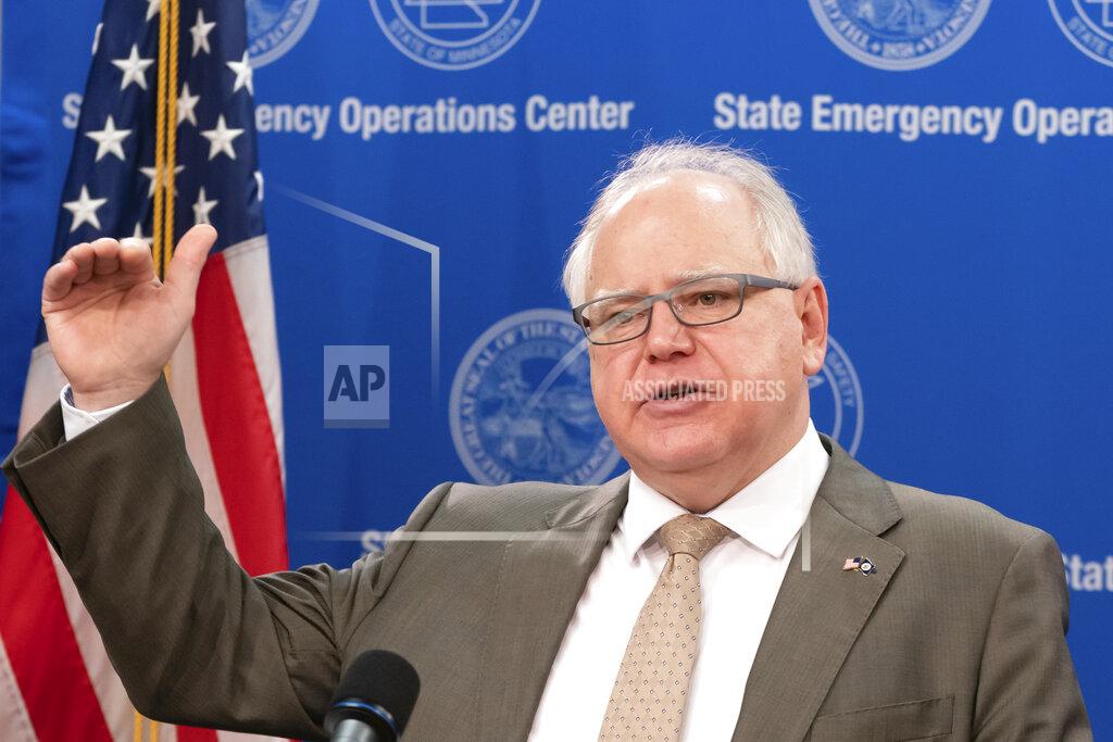 Glen Stubbe Minnesota Gov. Tim Walz announces new guidelines today for restaurants, bars, salons and barber shops during the coronavirus pandemic Wednesday, May 20, 2020. Restaurants and bars may reopen June 1 for outdoor dining with social distancing and other safeguards in place, while salons and barbershops will also be allowed to resume business at partial capacity. (Glen Stubbe/Star Tribune via AP)