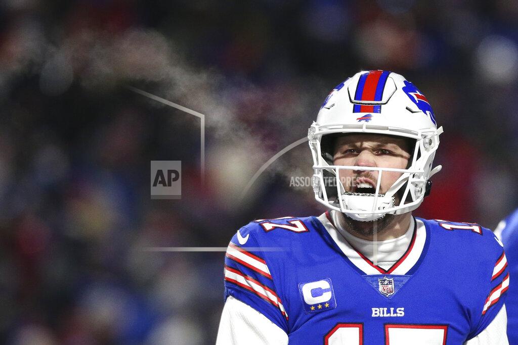 Joshua Bessex Buffalo Bills quarterback Josh Allen reacts after tight end Dawson Knox scores a touchdown during the first half of an NFL wild-card playoff football game against the New England Patriots, Saturday, Jan. 15, 2022, in Orchard Park, N.Y. (AP Photo/Joshua Bessex)