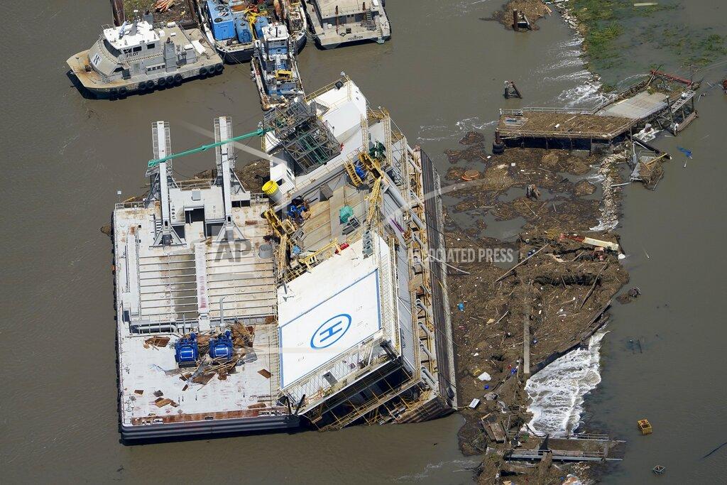 David J. Phillip A building is flooded Thursday, Aug. 27, 2020, after Hurricane Laura went through the area near Lake Charles, La. (AP Photo/David J. Phillip)