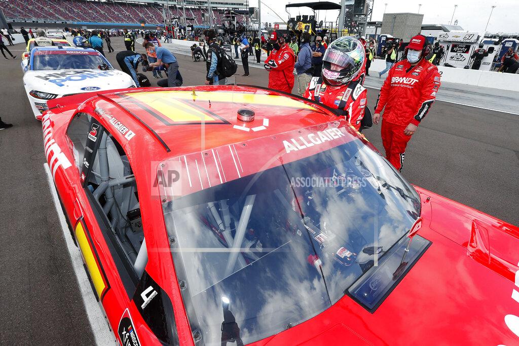 Ralph Freso Justin Allgaier (7) climbs into his race car prior to the NASCAR Xfinity Series auto race at Phoenix Raceway, Saturday, Nov. 7, 2020, in Avondale, Ariz. (AP Photo/Ralph Freso)