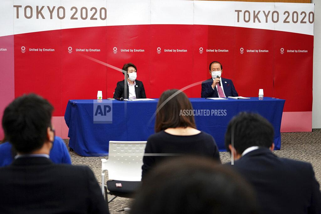 Eugene Hoshiko Seiko Hashimoto, left, president of the Tokyo 2020 Organizing Committee of the Olympic and Paralympic Games (Tokyo 2020), and Toshiro Muto, CEO of Tokyo 2020, attend a news conference Thursday, March 11, 2021, following the International Olympic Committee (IOC) general meeting. (AP Photo/Eugene Hoshiko, Pool)
