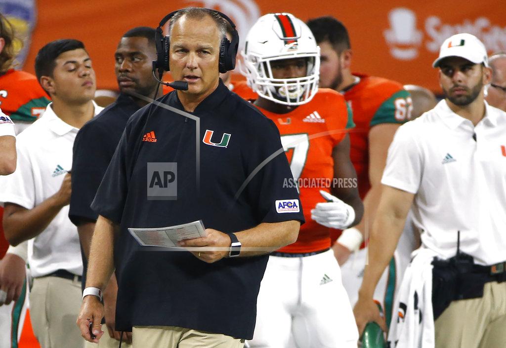 Miami coach Mark Richt watches from the sideline during the second half of the team's NCAA college football game against LSU on Sunday, Sept. 2, 2018, in Arlington, Texas. (AP Photo/Ron Jenkins)