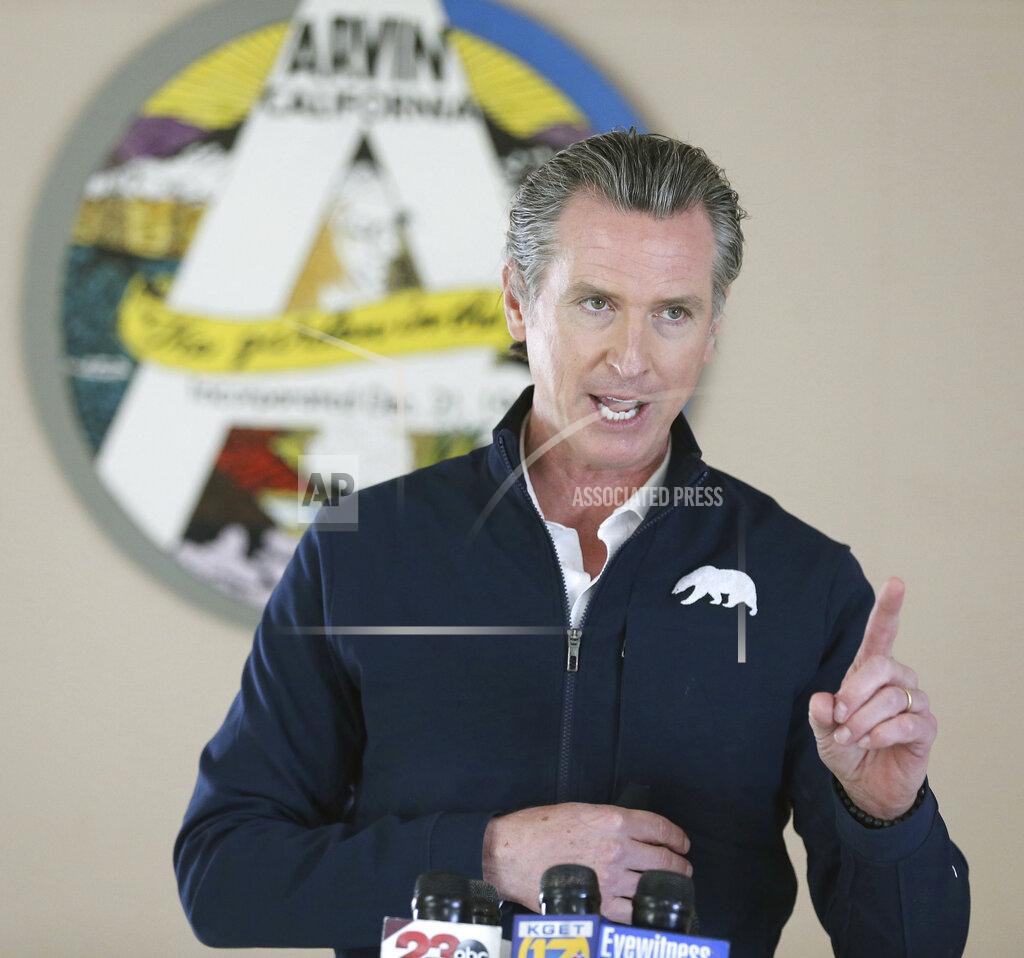Alex Horvath Californian Governor Gavin Newsom talks during a visit to Arvin Veterans Hall in Arvin, Calif. in Kern County on Monday, Feb. 22, 2021, to highlight the state's efforts to administer COVID-19 vaccines quickly and equitably across California. Newsom said more vaccines are headed to California's vast Central Valley, an agricultural region that has been hard hit by the coronavirus. (Alex Horvath/Bakersfield Californian via AP)