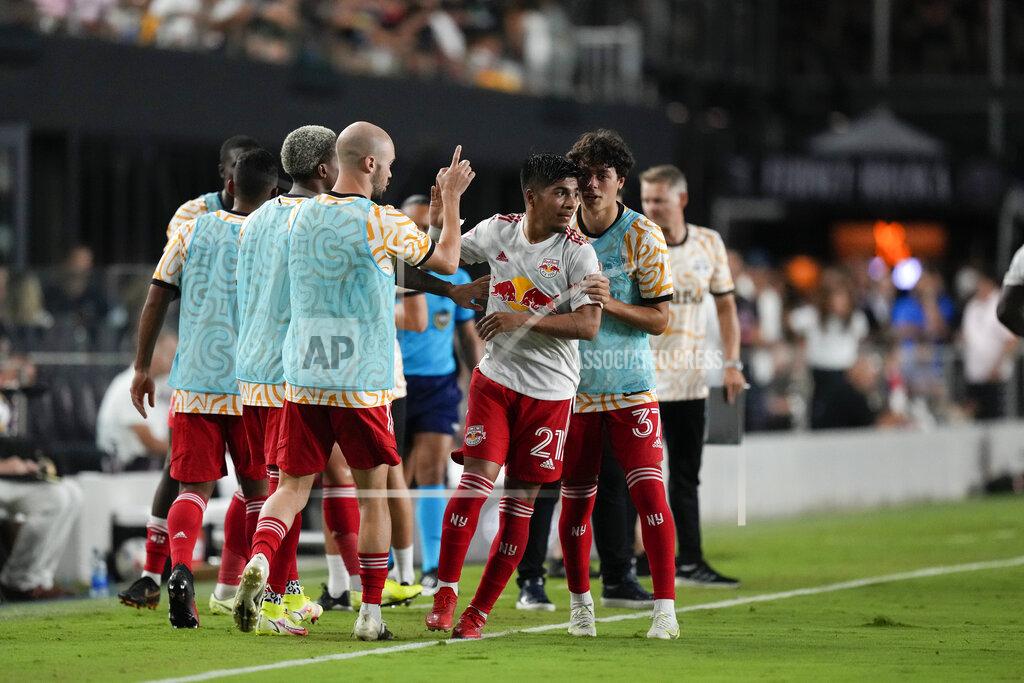 Rebecca Blackwell New York Red Bulls midfielder Omir Fernandez, center, is congratulated by teammates after scoring against Inter Miami during the first half of an MLS soccer match Friday, Sept. 17, 2021, in Fort Lauderdale, Fla. (AP Photo/Rebecca Blackwell)