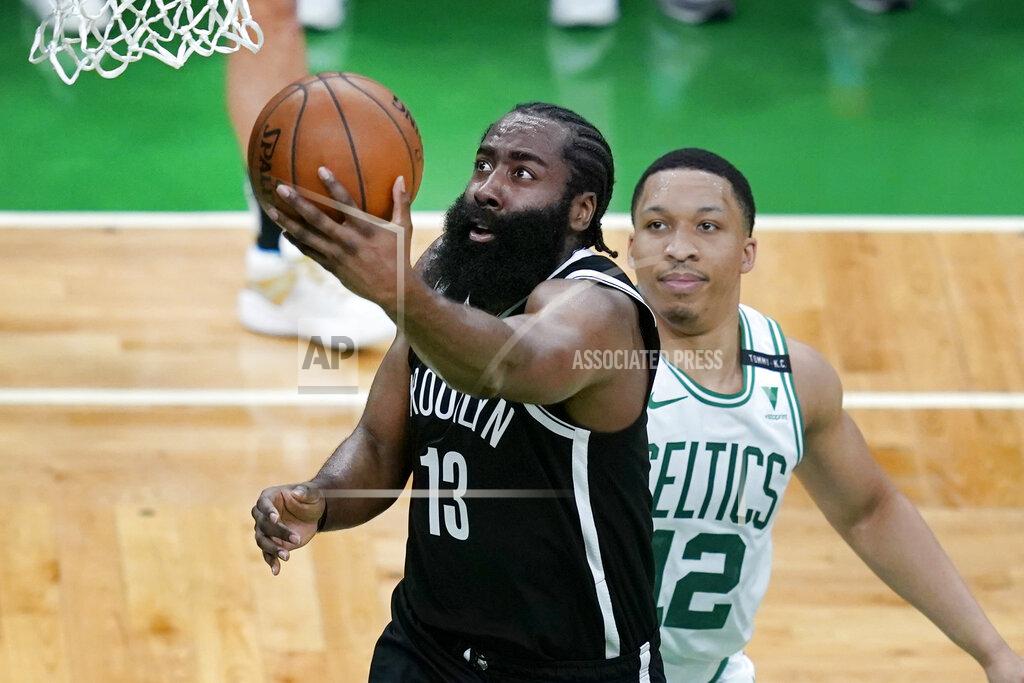 Elise Amendola Brooklyn Nets guard James Harden (13) drives to the hoop past Boston Celtics forward Grant Williams (12) in the second quarter of Game 4 during an NBA basketball first-round playoff series, Sunday, May 30, 2021, in Boston. (AP Photo/Elise Amendola)