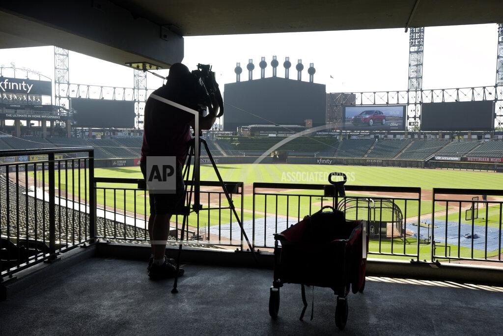 Mark Black Local media covers the first Chicago White Sox baseball practice at Guaranteed Rate Field on Friday, July 3, 2020, in Chicago. (AP Photo/Mark Black)