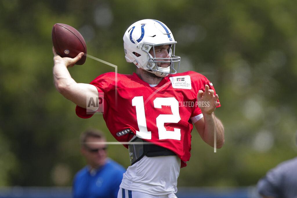 Michael Conroy Indianapolis Colts quarterback Andrew Luck (12) throws during practice at the NFL team's football training camp in Westfield, Ind., Sunday, July 28, 2019. (AP Photo/Michael Conroy)