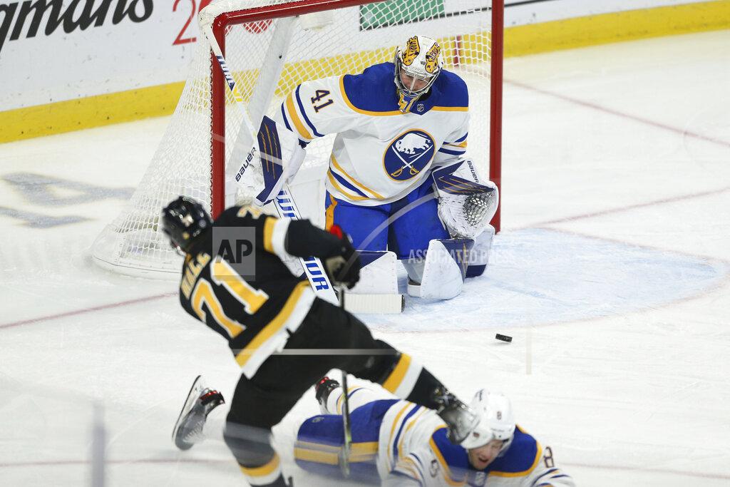 Joshua Bessex Buffalo Sabres goaltender Craig Anderson (41) prepares to block a shot by Boston Bruins left wing Taylor Hall (71) during the third period of an NHL hockey game Friday, Oct. 22, 2021, in Buffalo, N.Y. (AP Photo/Joshua Bessex)