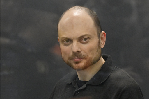 FILE - Russian opposition activist Vladimir Kara-Murza stands in a glass cage in a courtroom at the Moscow City Court in Moscow, Russia, Monday, July 31, 2023. Supporters of prominent Russian opposition figure Vladimir Kara-Murza Jr. say on Monday, Jan. 29, 2024 he has disappeared from the Siberian prison where he was behind bars. The 42-year-old Kara-Murza is serving a 25-year sentence for treason. (AP Photo/Dmitry Serebryakov, file)