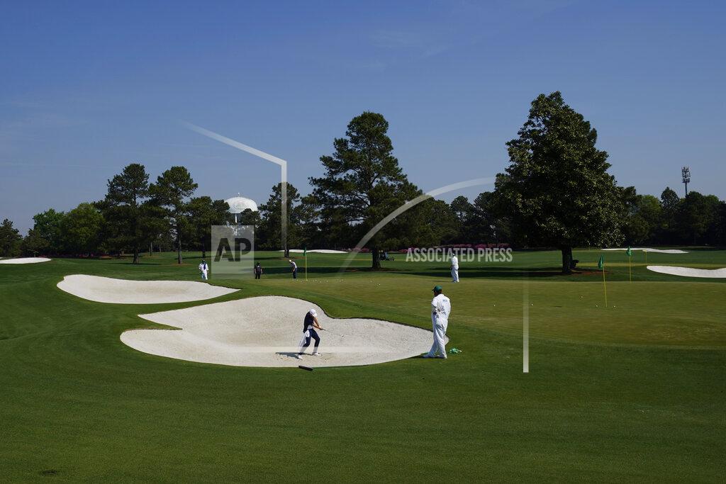Charlie Riedel Jordan Spieth hits out of a bunker on the driving range during a practice round for the Masters golf tournament on Wednesday, April 7, 2021, in Augusta, Ga. (AP Photo/Charlie Riedel)