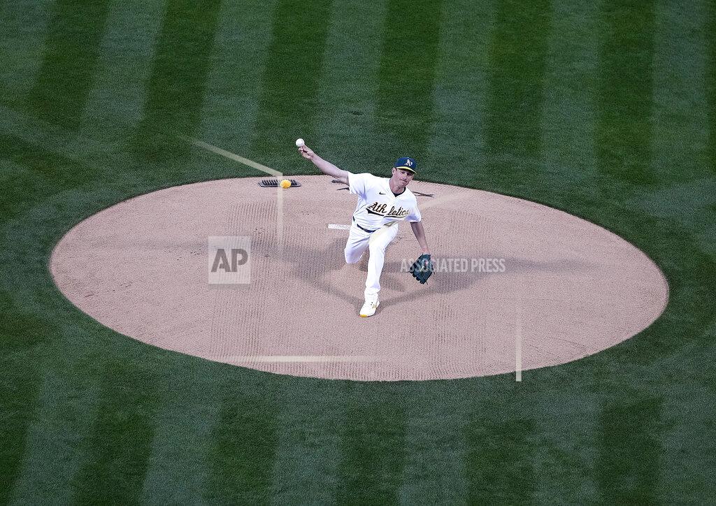 Tony Avelar Oakland Athletics pitcher Chris Bassitt (40) works against the Houston Astros in the first inning of an opening day baseball game Oakland, Calif., Thursday, April 1, 2021. (AP Photo/Tony Avelar)