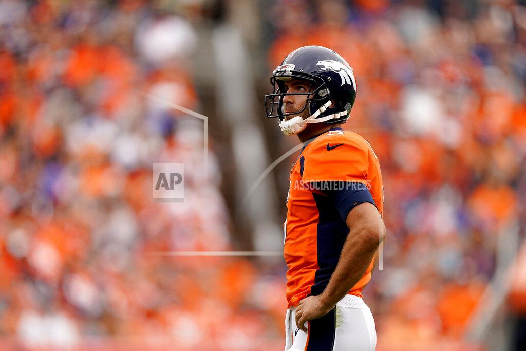 Jack Dempsey Denver Broncos quarterback Joe Flacco (5) looks a the clock during the second half of an NFL football game against the Chicago Bears, Sunday, Sept. 15, 2019, in Denver. (AP Photo/Jack Dempsey)