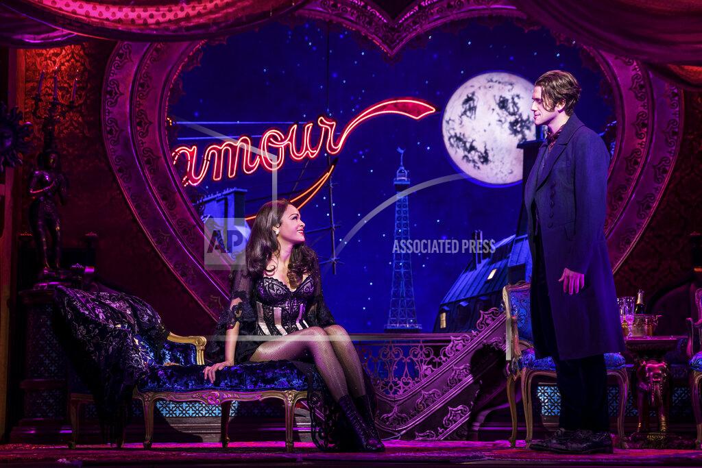 Matthew Murphy Aaron Tveit, right, appears with Karen Olivo during a performance of "Moulin Rouge! The Musical," in New York. Tveit was the only actor nominated for a Tony in the category of best leading actor in a musical for his role. (Matthew Murphy/Boneau/Bryan-Brown via AP)