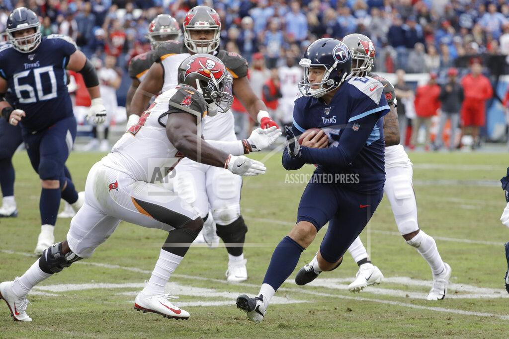 James Kenney Tennessee Titans kick holder Brett Kern (6) is stopped by Tampa Bay Buccaneers linebacker Devin White on a fake field goal play in the second half of an NFL football game Sunday, Oct. 27, 2019, in Nashville, Tenn. (AP Photo/James Kenney)