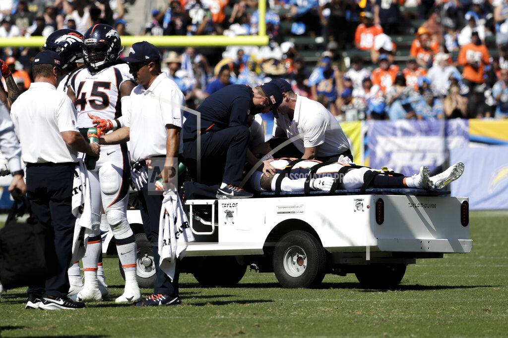 Alex Gallardo FILE - In this Sunday, Oct. 6, 2019 file photo, Denver Broncos cornerback DeVante Bausby is taken off the field after being hurt during the first half of an NFL football game against the Los Angeles Chargers, in Carson, Calif. Broncos cornerback De'Vante Bausby says he was paralyzed for 30 minutes Sunday after he wrenched his neck colliding with linebacker Alexander Johnson while making a tackle on Chargers running back Austin Ekeler. (AP Photo/Alex Gallardo, File)