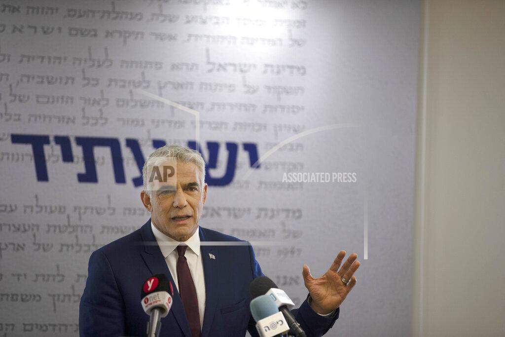 Maya Alleruzzo Yesh Atid party leader Yair Lapid speaks to journalists at the Knesset, Israel's Parliament, Monday, June 7, 2021. (AP Photo/Maya Alleruzzo, Pool)