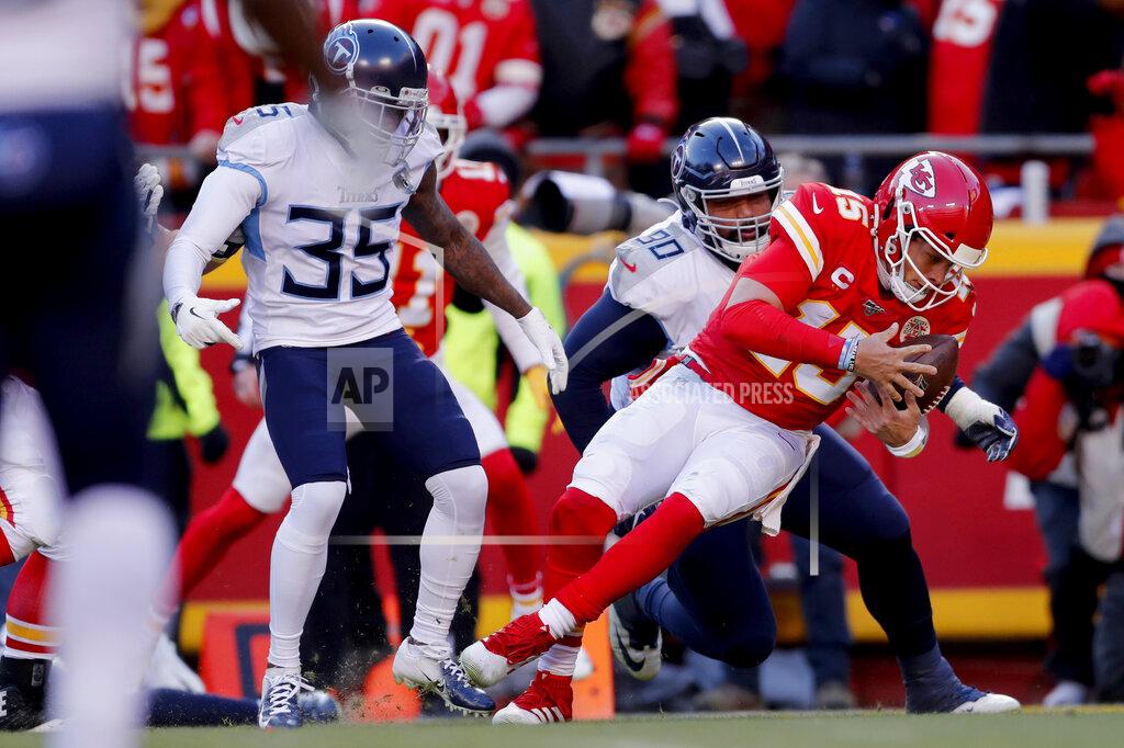 Jeff Roberson Kansas City Chiefs' Patrick Mahomes runs for a touchdown past Tennessee Titans defensive tackle DaQuan Jones (90) and cornerback Tramaine Brock Sr. (35) during the first half of the NFL AFC Championship football game Sunday, Jan. 19, 2020, in Kansas City, MO. (AP Photo/Jeff Roberson)