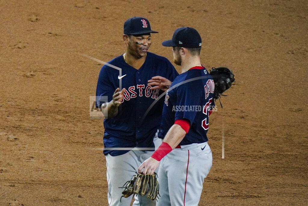 Frank Franklin Ii Boston Red Sox's Rafael Devers, left, celebrates with teammate Christian Arroyo after a baseball game against the New York Yankees, Friday, June 4, 2021, in New York. (AP Photo/Frank Franklin II)