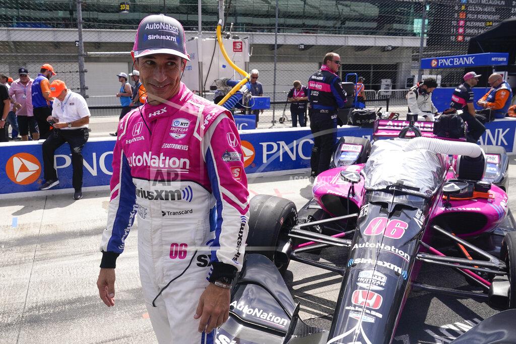 Darron Cummings Helio Castroneves, of Brazil, waits in the pits before a IndyCar auto race at Indianapolis Motor Speedway, Saturday, July 30, 2022, in Indianapolis. (AP Photo/Darron Cummings)