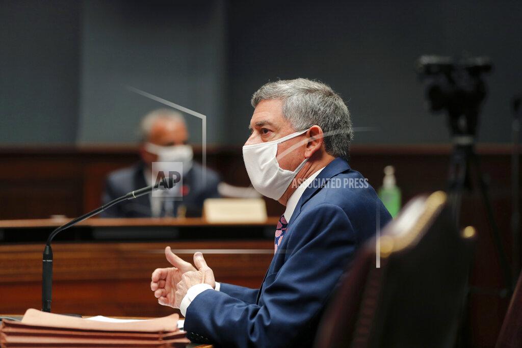 FILE - In this May 4, 2020 file photo, Commissioner of Administration Jay Dardenne testifies before the Louisiana House Appropriations Committee, in Baton Rouge, La. Louisiana senators Monday, March 22, 2021, opened their latest budget hearings with concerns about using short-term federal coronavirus aid to pay for ongoing services and programs since the federal cash will disappear in later years. Dardenne, the governor’s chief budget adviser, said the administration believes Louisiana's economy will return to pre-pandemic tax collections in later years, with growth to offset the lost federal aid. (AP Photo/Gerald Herbert, File)