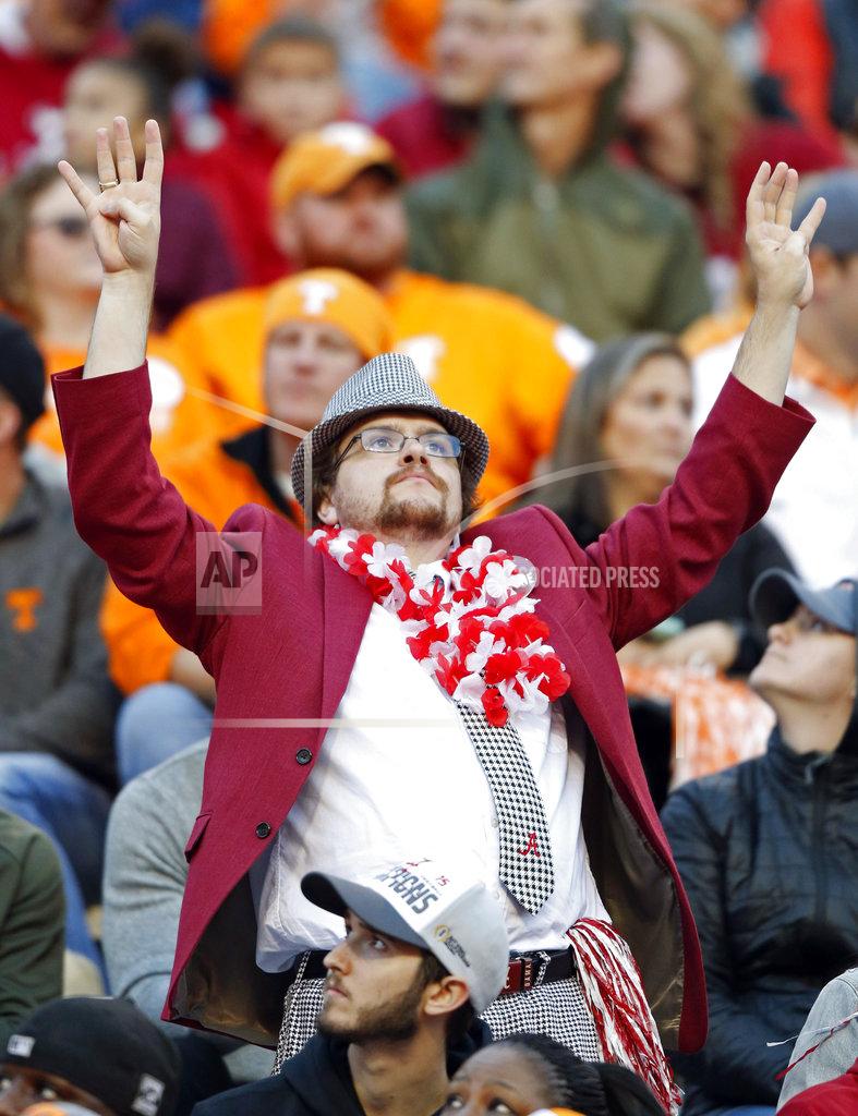 Wade Payne An Alabama fan signals the beginning of the fourth quarter of an NCAA college football game against Tennessee Saturday, Oct. 20, 2018, in Knoxville, Tenn. Alabama won 58-21. (AP Photo/Wade Payne)
