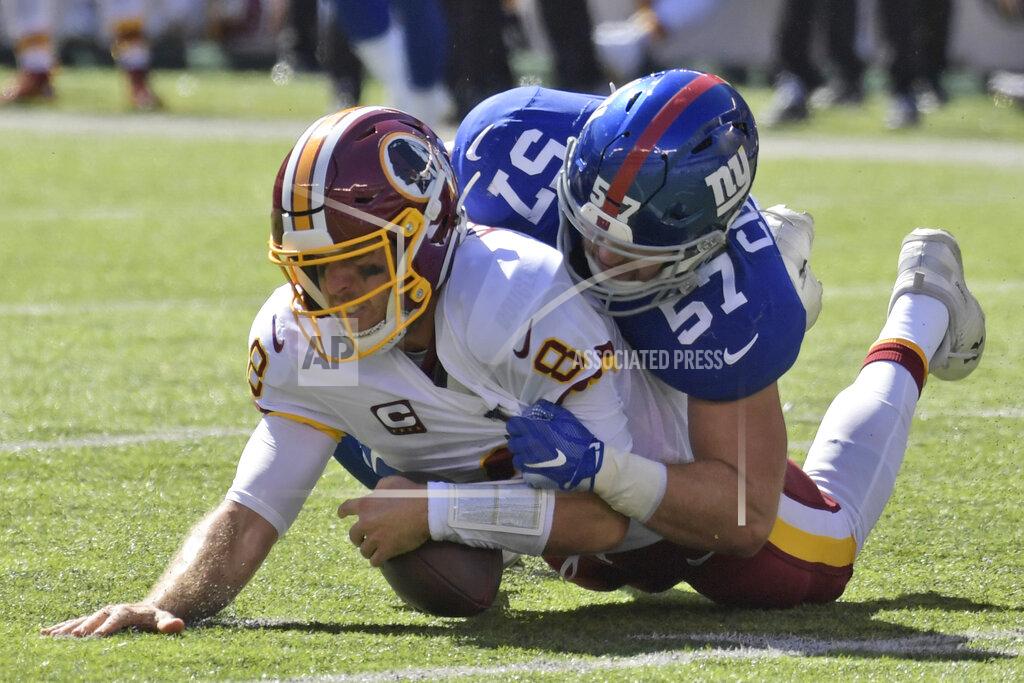 Bill Kostroun New York Giants' Ryan Connelly, right, tackles Washington Redskins quarterback Case Keenum during the first half of an NFL football game, Sunday, Sept. 29, 2019, in East Rutherford, N.J. (AP Photo/Bill Kostroun)