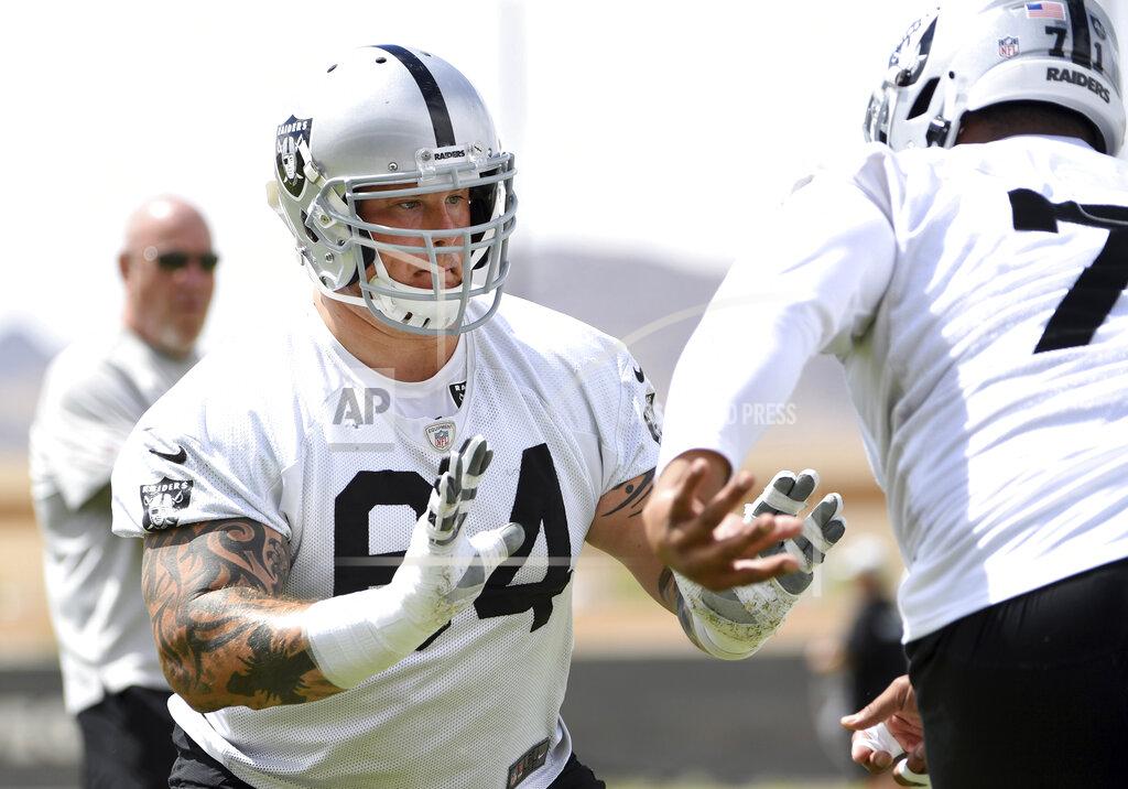 David Becker Las Vegas Raiders guard Richie Incognito (64) performs a drill during an NFL football organized team activity at the team's training facility Wednesday, May 26, 2021, in Henderson, Nev. (AP Photo/David Becker)