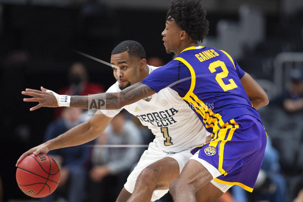 Hakim Wright Sr. LSU guard Eric Gaines (2) defends against Georgia Tech guard Kyle Sturdivant (1) during the first half of an NCAA college basketball game Saturday, Dec. 11, 2021, in Atlanta. (AP Photo/Hakim Wright Sr.)