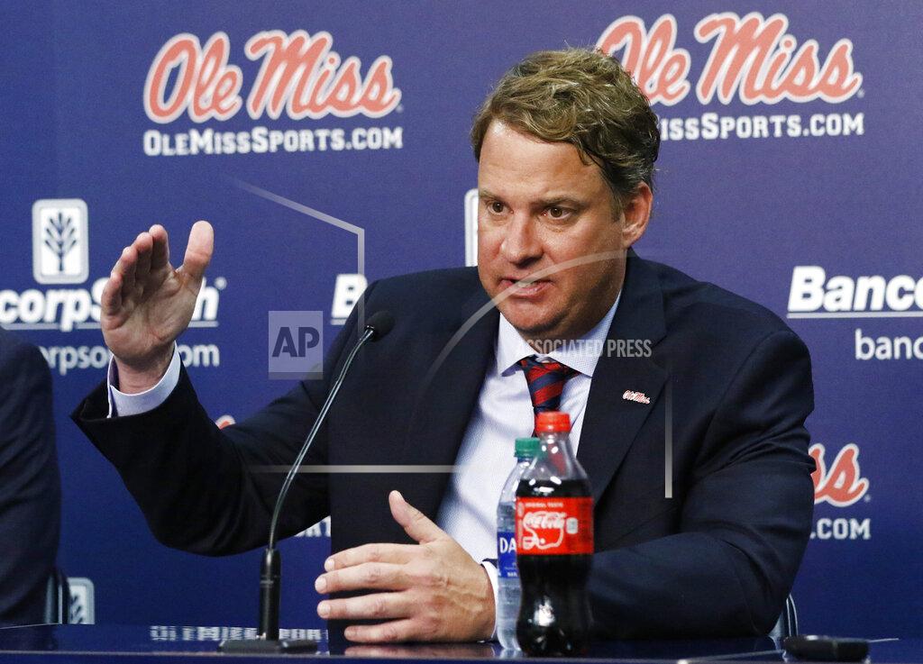 Rogelio V. Solis Lane Kiffin responds to reporters questions at a news conference, after being introduced to Mississippi fans as their new NCAA college football coach, at The Pavilion, a multipurpose arena on the campus in Oxford, Miss., Monday, Dec. 9, 2019. Kiffin was previously, the football coach for three years at Florida Atlantic. (AP Photo/Rogelio V. Solis)