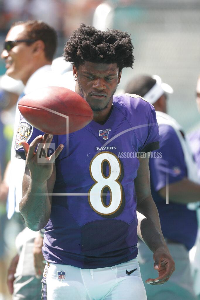Wilfredo Lee Baltimore Ravens quarterback Lamar Jackson (8) rests on the sidelines, during the second half at an NFL football game against the Miami Dolphins, Sunday, Sept. 8, 2019, in Miami Gardens, Fla. (AP Photo/Wilfredo Lee)