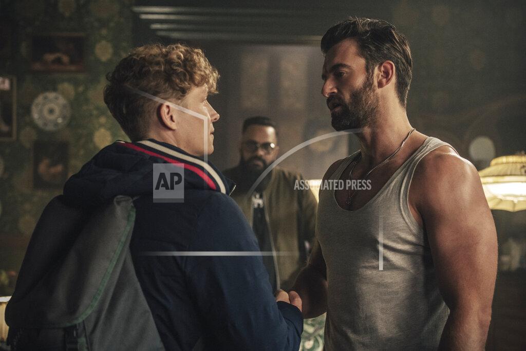 Stanislav Honzik This image released by Netflix shows Matthias Schweighöfer, left, and Stuart Martin in "Army of Thieves." (Stanislav Honzik/Netflix via AP)