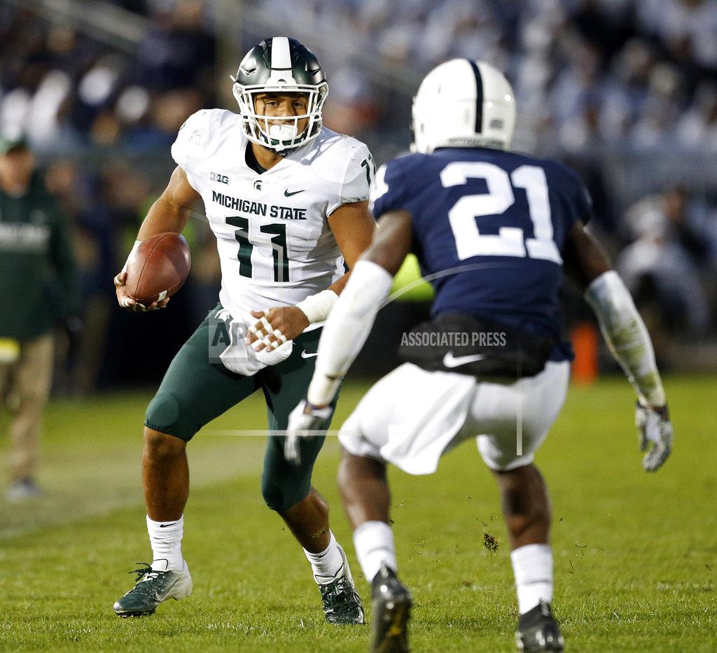 Chris Knight Michigan State's Connor Heyward (11) looks to take on Penn State's Amani Oruwariye (21) after a catch during the second half of an NCAA college football game in State College, Pa., Saturday, Oct. 13, 2018. (AP Photo/Chris Knight)
