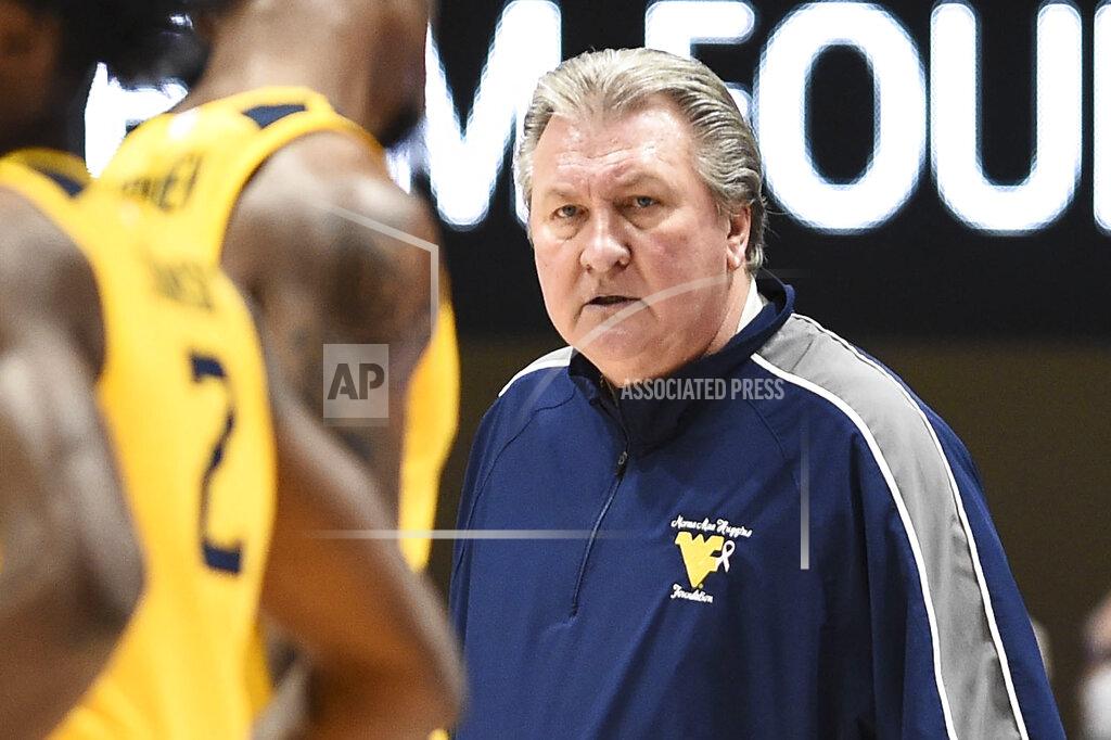 William Wotring West Virginia head coach Bob Huggins reacts to a play during the first half of an NCAA college basketball game against Baylor in Morgantown, W.Va., Tuesday, Jan. 18, 2022. (William Wotring)