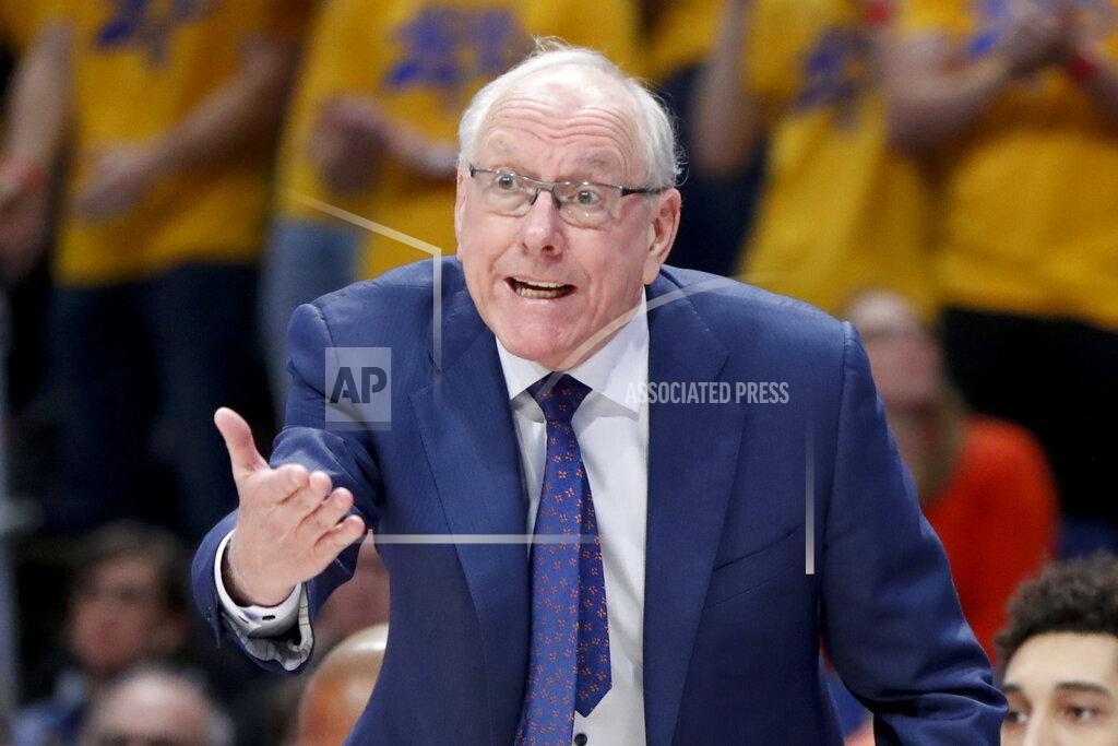 Keith Srakocic FILE - In this Feb. 26, 2020, file photo, Syracuse head coach Jim Boeheim instructs his team as they play against Pittsburgh during the first half of an NCAA college basketball game in Pittsburgh. Boeheim is among the coaches 65 and up who have contracted COVID-19, which can be a greater threat the older you are. (AP Photo/Keith Srakocic, File)