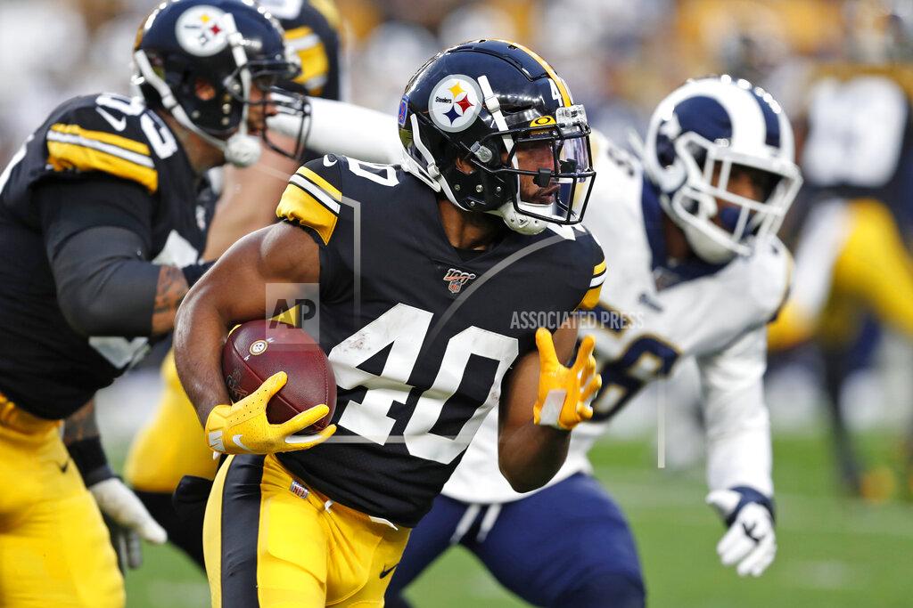 Keith Srakocic Pittsburgh Steelers running back Tony Brooks-James (40) carries the ball during the first half of an NFL football game against the Los Angeles Rams in Pittsburgh, Sunday, Nov. 10, 2019. (AP Photo/Keith Srakocic)