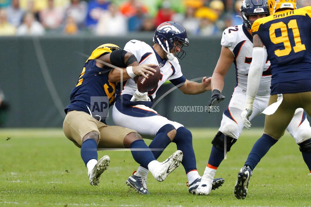 Matt Ludtke Denver Broncos quarterback Joe Flacco, right, is sacked by Green Bay Packers linebacker Rashan Gary during the second half of an NFL football game Sunday, Sept. 22, 2019, in Green Bay, Wis. (AP Photo/Matt Ludtke)
