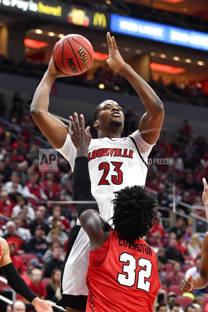 Timothy D. Easley Louisville center Steven Enoch (23) shoots over the defense of Youngstown State guard Garrett Covington (32) during the second half of an NCAA college basketball game in Louisville, Ky., Sunday, Nov. 10, 2019. (AP Photo/Timothy D. Easley)