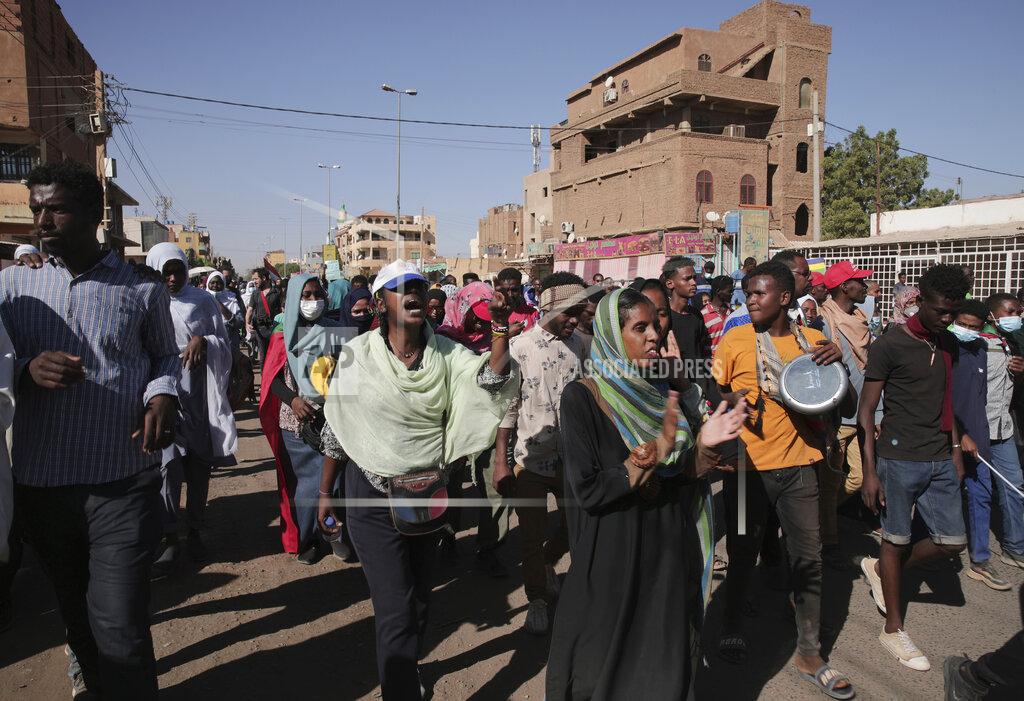 Marwan Ali Thousands of protesters take to the streets to renew their demand for a civilian government in the Sudanese capital Khartoum, Thursday, Nov. 25, 2021. The rallies came just days after the military signed a power-sharing deal with the prime minister, after releasing him from house arrest and reinstating him as head of government. The deal came almost a month after the generals orchestrated a coup. Sudan’s key pro-democracy groups and political parties have dismissed the deal as falling short of their demands for a fully civilian rule. (AP Photo/Marwan Ali)