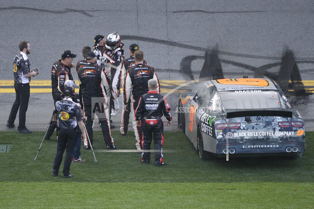Chris O'meara Noah Gragson celebrates with his crew after winning the NASCAR Xfinity series auto race Saturday, Feb. 15, 2020, at Daytona International Speedway in Daytona Beach, Fla. (AP Photo/Chris O'Meara)