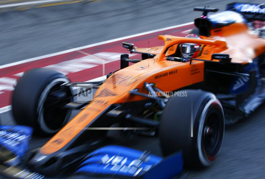 Joan Monfort Mclaren driver Carlos Sainz of Spain pulls out of the pit lane during the Formula One pre-season testing session at the Barcelona Catalunya racetrack in Montmelo, outside Barcelona, Spain, Friday, Feb. 28, 2020. (AP Photo/Joan Monfort)