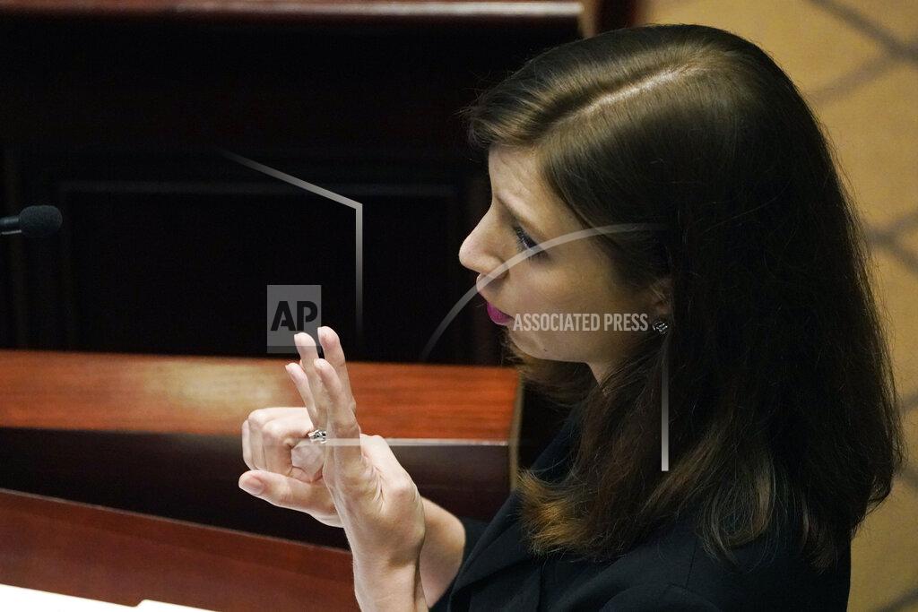 Rogelio V. Solis Attorney Kaytie Pickett argues before the Mississippi Supreme Court, Wednesday, April 14, 2021, in Jackson, on behalf of Madison Mayor Mary Hawkins Butler. The mayor filed a lawsuit challenging a medical marijuana initiative by saying because Mississippi's initiative process is outdated and the issue should not have been on the ballot because of the way signatures were gathered. Voters approved the medical marijuana initiative in November 2020. (AP Photo/Rogelio V. Solis)