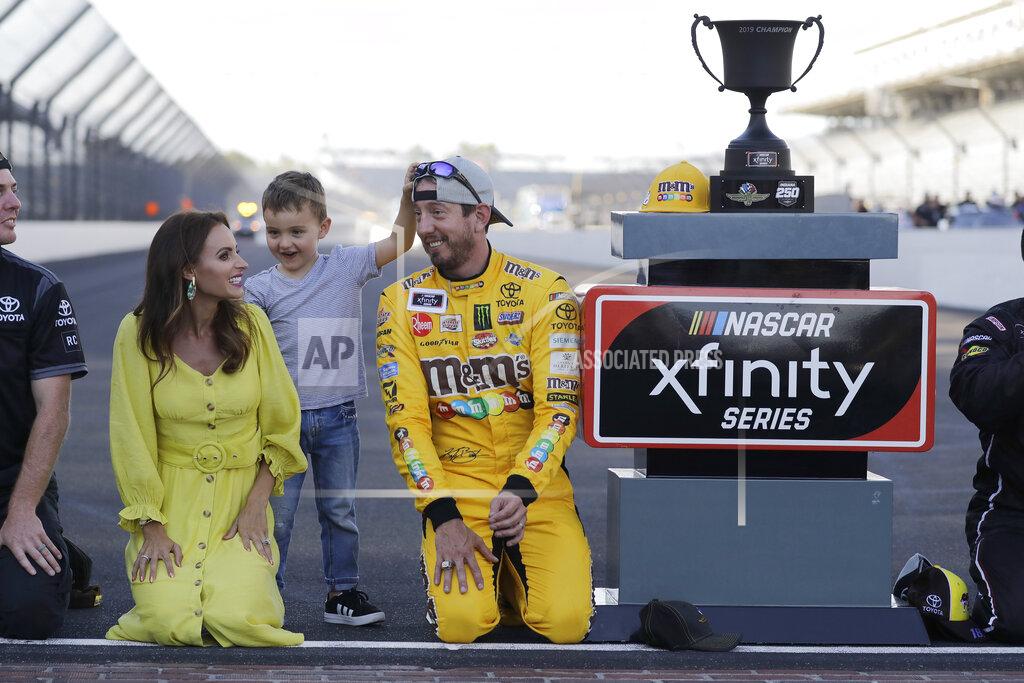 Darron Cummings NASCAR Xfinity Series driver Kyle Busch celebrates with his wife, Samantha, and son, Brexton, after winning the NASCAR Xfinity auto race at the Indianapolis Motor Speedway, Saturday, Sept. 7, 2019 in Indianapolis. (AP Photo/Darron Cummings)