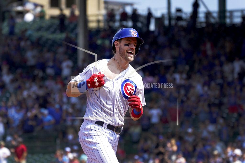 Charles Rex Arbogast Chicago Cubs' Patrick Wisdom celebrates his home run off Cincinnati Reds starting pitcher Luis Castillo during the fourth inning of a baseball game Thursday, July 29, 2021, in Chicago. (AP Photo/Charles Rex Arbogast)