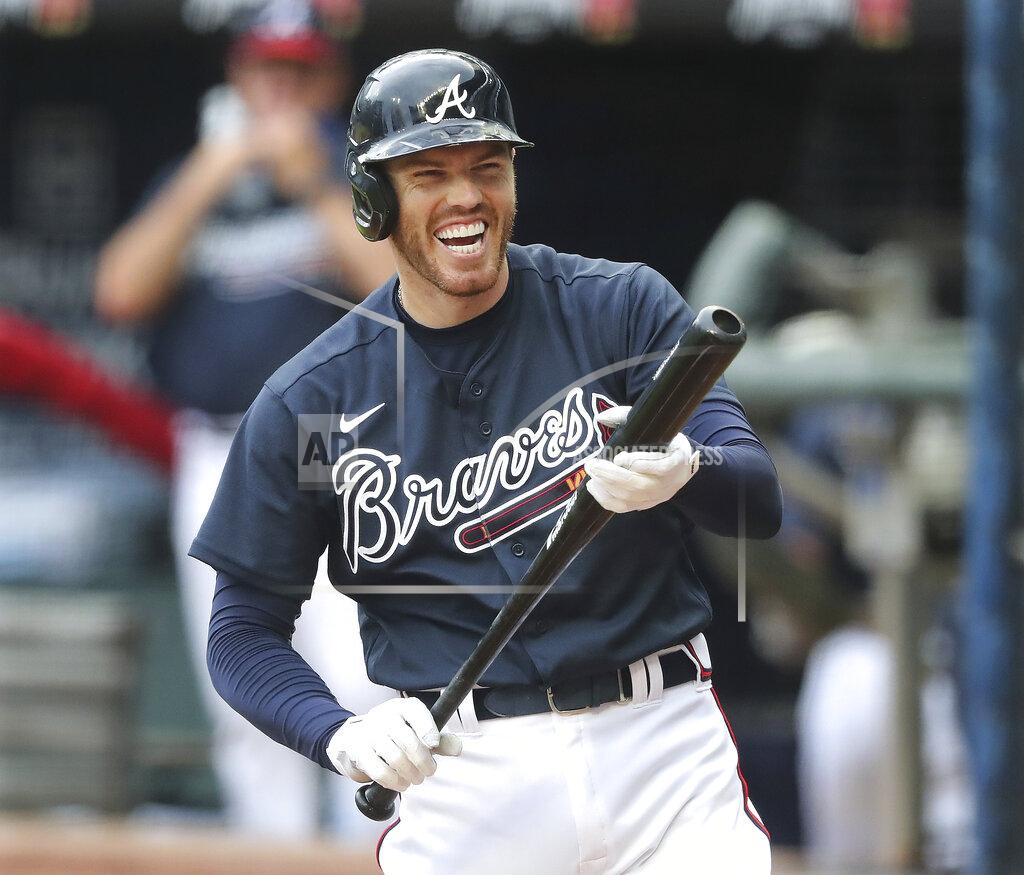 Curtis Compton Atlanta Braves first baseman Freddie Freeman reacts during an intrasquad baseball game Saturday, July 18, 2020, in Atlanta. It was Freeman's first game since his battle with COVID-19. (Curtis Compton/Atlanta Journal-Constitution via AP)