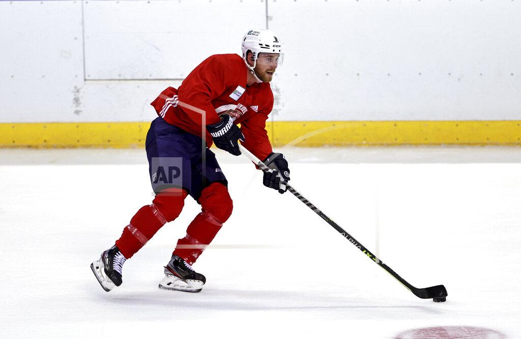 David Santiago Florida Panthers center Sam Bennett skates with the puck during an NHL hockey training camp Thursday, Sept. 23, 2021, in Sunrise, Fla. (David Santiago/Miami Herald via AP)