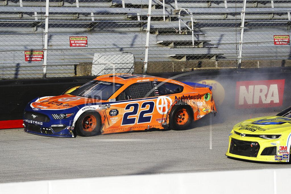 Mark Humphrey Joey Logano (22) drives the final lap in a NASCAR Cup Series auto race at Bristol Motor Speedway Sunday, May 31, 2020, in Bristol, Tenn. Logano had taken the lead but collided with Chase Elliott with three laps remaining. Their cars made contact in the fourth turn and drifted into the wall, allowing Brad Keselowski to come from third place for the win. (AP Photo/Mark Humphrey)